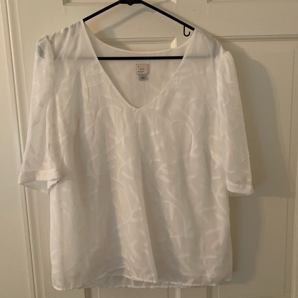 Top, flattering with Capri pants